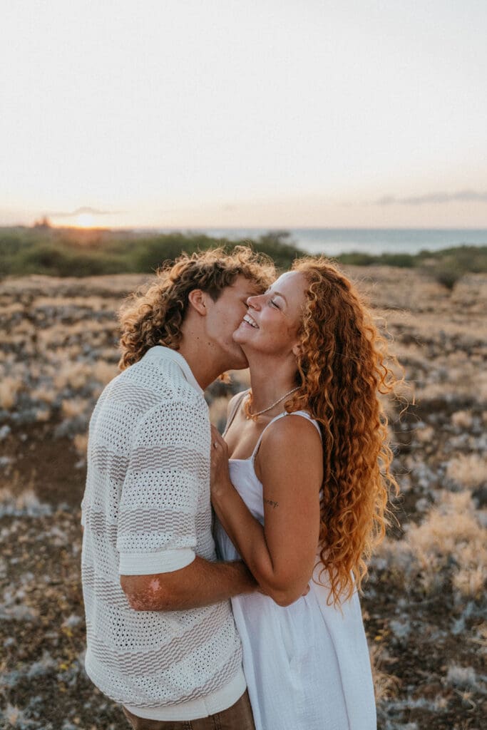 Couple Kissing On The Big Island At Sunset