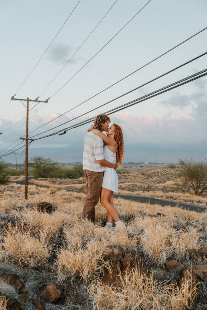 Couple Kissing On The Big Island At Sunset