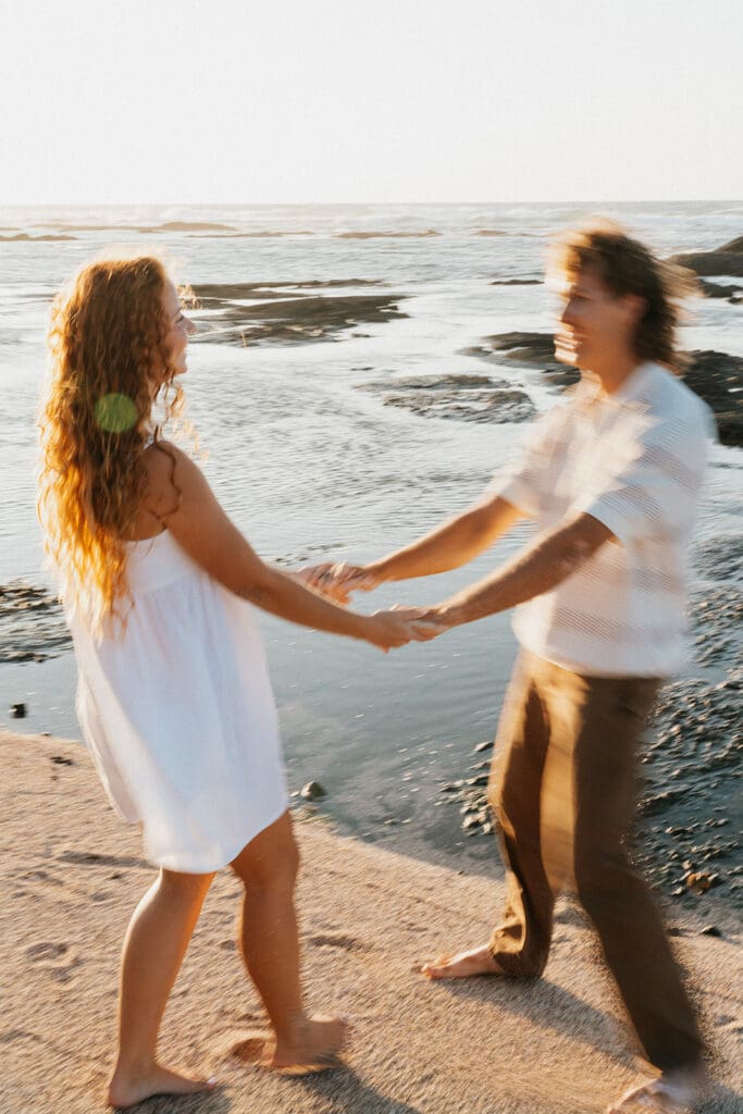 Couple Walking On The Beach On The Big Island At Sunset