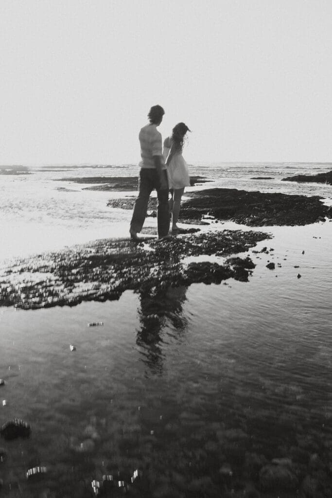 Couple Walking On The Beach On The Big Island At Sunset
