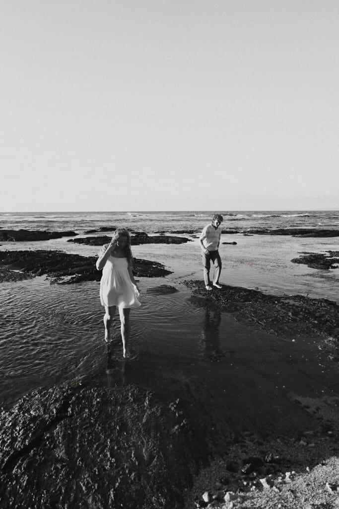 Couple Walking On The Beach On The Big Island At Sunset