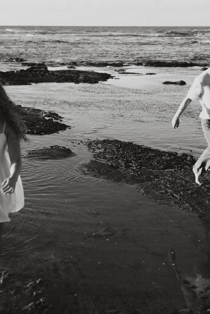 Couple Walking On The Beach On The Big Island At Sunset