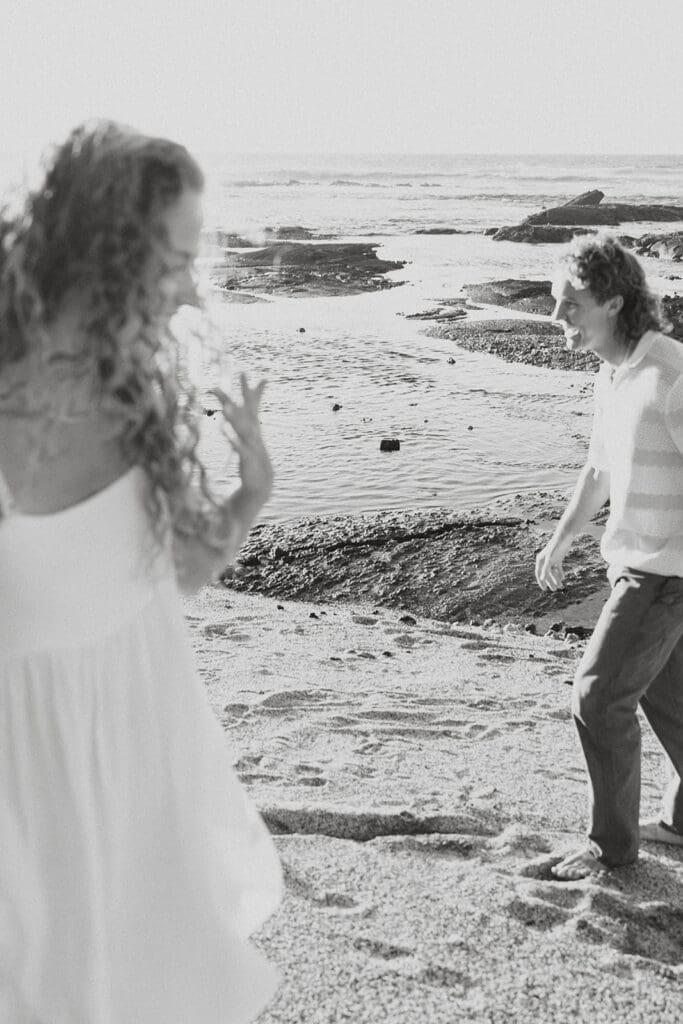 Couple Walking On The Beach On The Big Island At Sunset